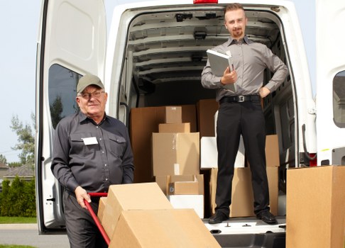 Man and van loading boxes for a London move