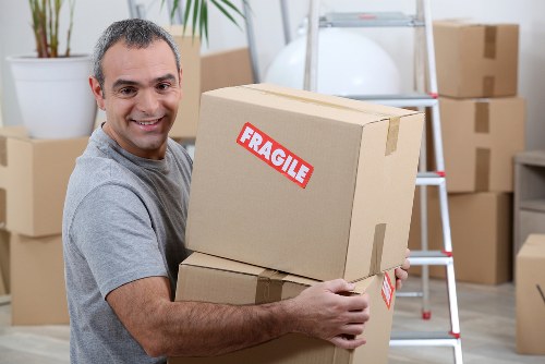 Professional removal team preparing for a London home or office move