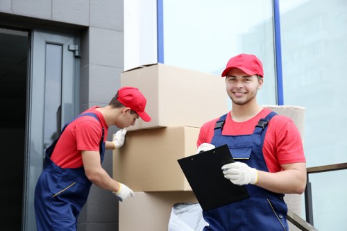 Removal team helping with a London flat move