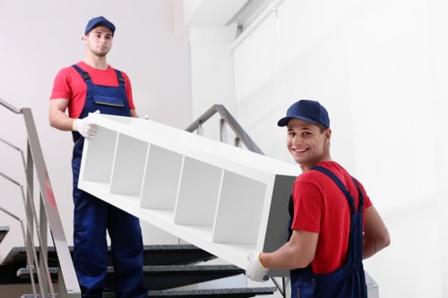 Man and van removal team helping with a London flat move