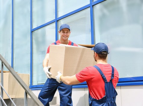 Local team handling furniture removal from a London apartment building
