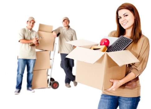 Unpacking boxes inside a London property after a move